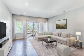 Chicago apartment for rent - a living room with a couch and a coffee table