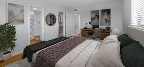 Miami apartment for rent - Bright bedroom with a workspace, ensuite bathroom, and walk-in closet.