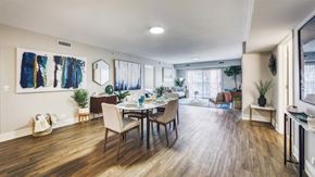 Des Plaines apartment for rent - A dining room with a wooden table and chairs.