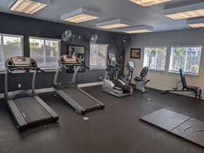 Vancouver apartment for rent - A gym with treadmills, elliptical machines, and other exercise equipment.