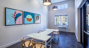 Championsgate apartment for rent - A dining room with a white table and chairs.
