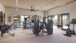 Santa Fe apartment for rent - A spacious gym with a variety of equipment and a view of the outdoors.