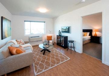 Portland apartment for rent - a living room with a couch and a table