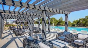 Georgetown apartment for rent - Outdoor pergola seating at Georgetown TX apartments near Wolf Ranch Town Center