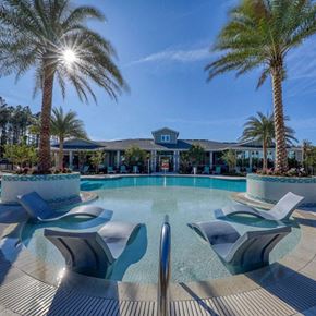 Jacksonville apartment for rent - Resort-style swimming pool with sundeck at The Ridley Apartments near St. Johns Town Center and Jacksonville Beaches.