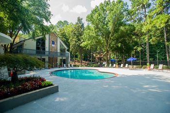Resort-style pool with lounge seating