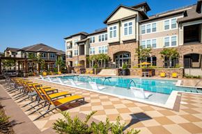 Huntersville apartment for rent - Exterior apartment building with pool and pool furniture