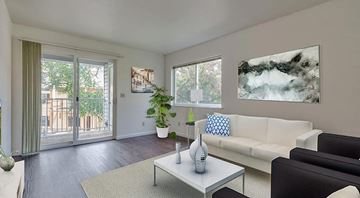 Coeur D Alene apartment for rent - a living room with a white couch and a table