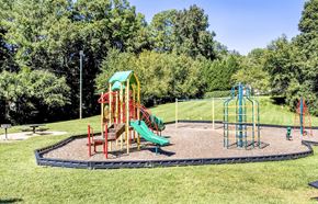 Raleigh apartment for rent - Playground with safe play equipment at Grand Arbor Reserve Apartments in Raleigh, NC 27607, near Central Raleigh.