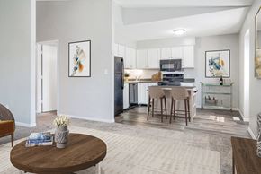 Springfield apartment for rent - A modern kitchen with a dining table and chairs.