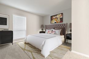 Raleigh apartment for rent - the timbers raleigh nc apartments for rent bedroom with large window and modern bedroom furnishings and matching artwork and area rug on top of plush carpet