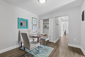 Tampa apartment for rent - A dining room with a table and chairs.