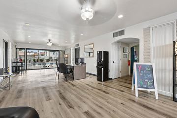 Tucson apartment for rent - A room with a chalkboard sign that says "You put a piece of our love in your heart".