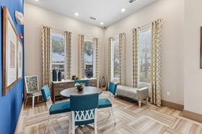 New Port Richey apartment for rent - A dining room with a blue table and chairs.