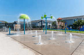 Plainsboro Township apartment for rent - A playground with a water feature in the foreground.