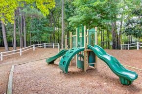 Duluth apartment for rent - Community playground with safe play equipment at Grande Club apartments in Duluth, GA 30096, near Lawrenceville.