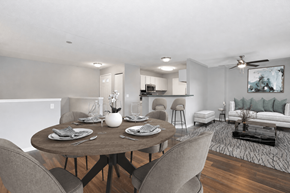 Burnsville townhouse for rent - Virtually staged dining and living area at Summit Townhomes in Burnsville, MN, with breakfast bar seating.