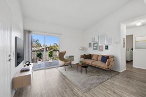 San Dimas apartment for rent - Bright living room with wood-style floors at Sunnyside Senior Apartments in San Dimas, CA