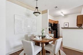 Hinesville apartment for rent - Open-concept dining area next to the kitchen at Tattersall Village Apartments near Richmond Hill, GA