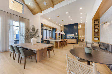 Manor apartment for rent - A modern dining room with a large table and chairs.