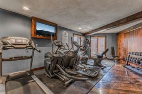 Overland Park apartment for rent - Treetop Lodge Apartments in Overland Park, KS photo of fitness center- free weights, cardio machines