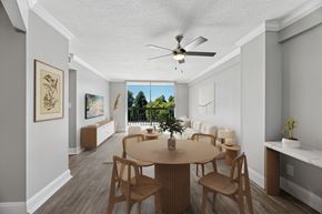 Wilton Manors apartment for rent - Dining area and open living space inside a renovated apartment at Wilton Tower in Wilton Manors, FL.

15. shooootin-photo-15_final