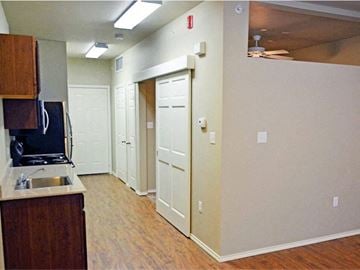 Lubbock apartment for rent - A kitchen area with a sink and cabinets.