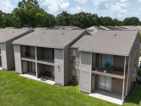 Baton Rouge apartment for rent - Apartment complex with multiple buildings and balconies.