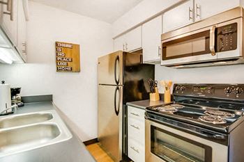 Updated black and stainless steel appliances