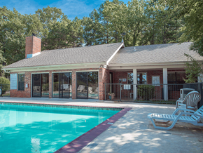 Little Rock apartment for rent - a swimming pool in front of the club house with a pool