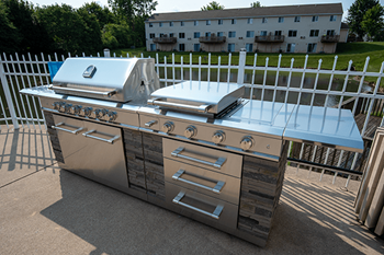 Outdoor kitchen with gas grill