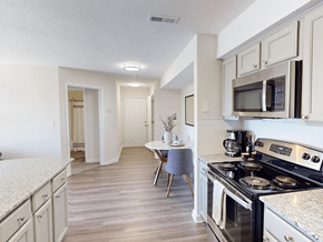 Birmingham apartment for rent - apartment kitchen with appliances including a microwave