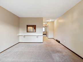 Toledo apartment for rent - spacious apartmnt living room with white walls and carpeting