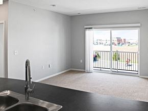 Ashland apartment for rent - A kitchen with a sink and a view of the outside.