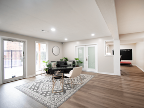 Wichita apartment for rent - A modern dining room with a black table and chairs.