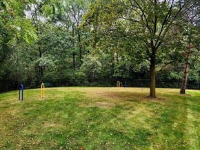 Waukegan apartment for rent - a park with a playground and a tree