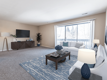 Grand Blanc apartment for rent - a living room with white furniture and a large window