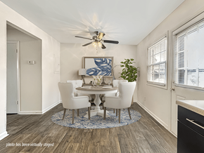 Wilmington apartment for rent - A dining room with a table set for four.