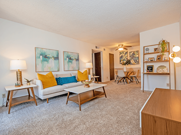 Wichita apartment for rent - a living room with a couch and a table