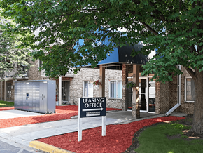 Brooklyn Park apartment for rent - A leasing office is located in a building with a brick facade.