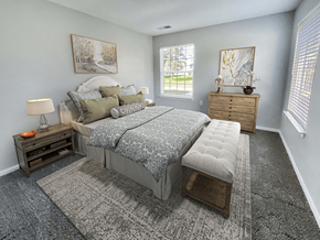 Holly apartment for rent - a bedroom with a bed and two dressers and a window