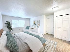 Grand Rapids apartment for rent - a bedroom with a bed and a closet