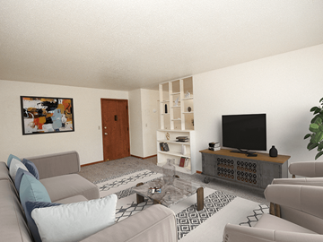 South Sioux City apartment for rent - a living room with a couch and a television