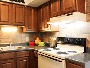 St. Ann apartment for rent - fully equipped kitchen with a stove and a sink