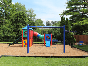 St. Ann apartment for rent - a playground with a slide at Imperial Gardens Apartments