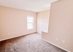 Columbus townhouse for rent - an empty room with carpet and a window