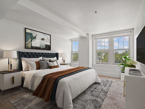 Moline apartment for rent - bedroom with a bed with big window