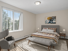 St. Joseph apartment for rent - a bedroom with a bed and two windows
