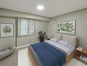 Haslett apartment for rent - A bedroom with a large bed and a potted plant.
