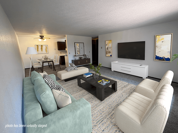 Waite Park apartment for rent - A living room with a white couch and a coffee table.